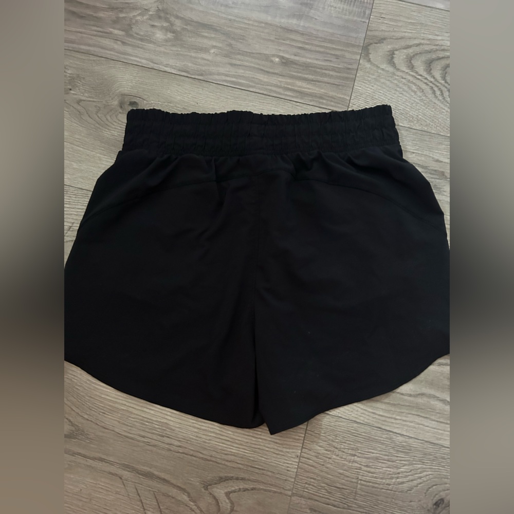 Under Armour athletic shorts. Size: Medium